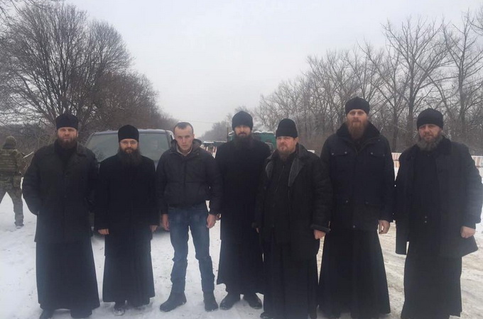 UOC clergy help release captured