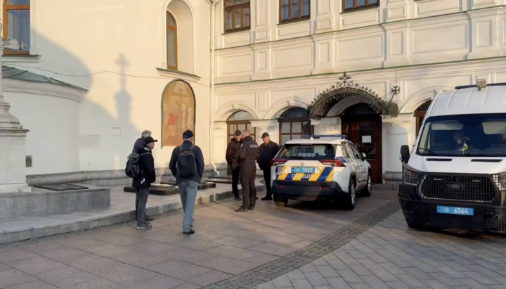Police and Reserve officials take control of the Near and Far Caves of the Lavra. Photo: UOJ